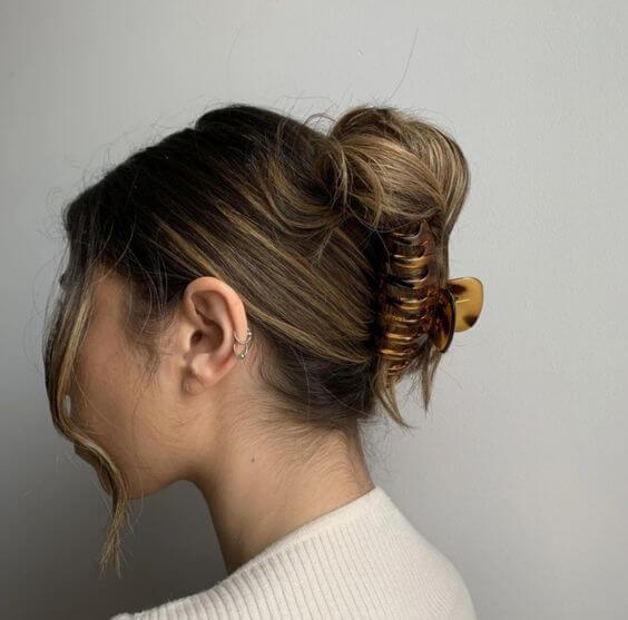 90s claw clip updo strands