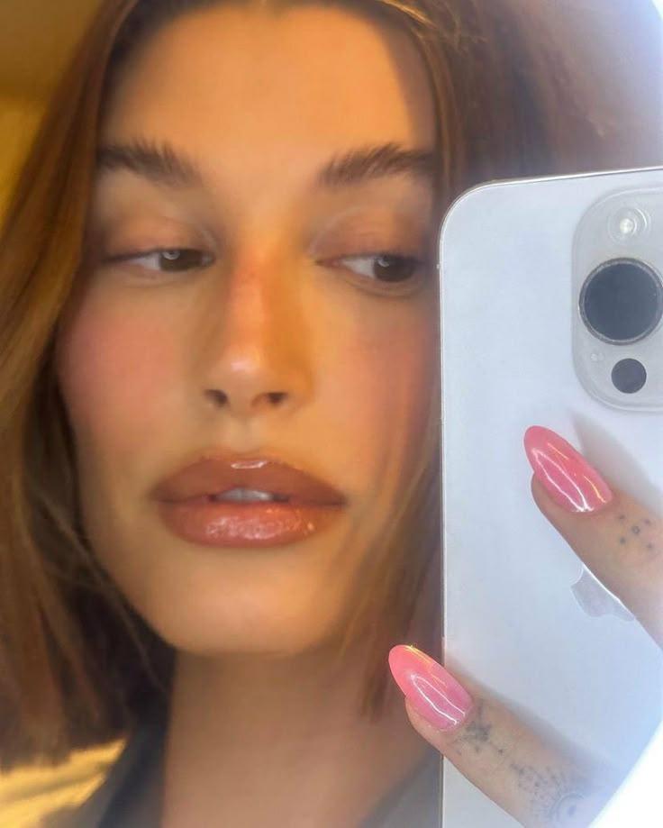 Celebrity pink chrome nail trend