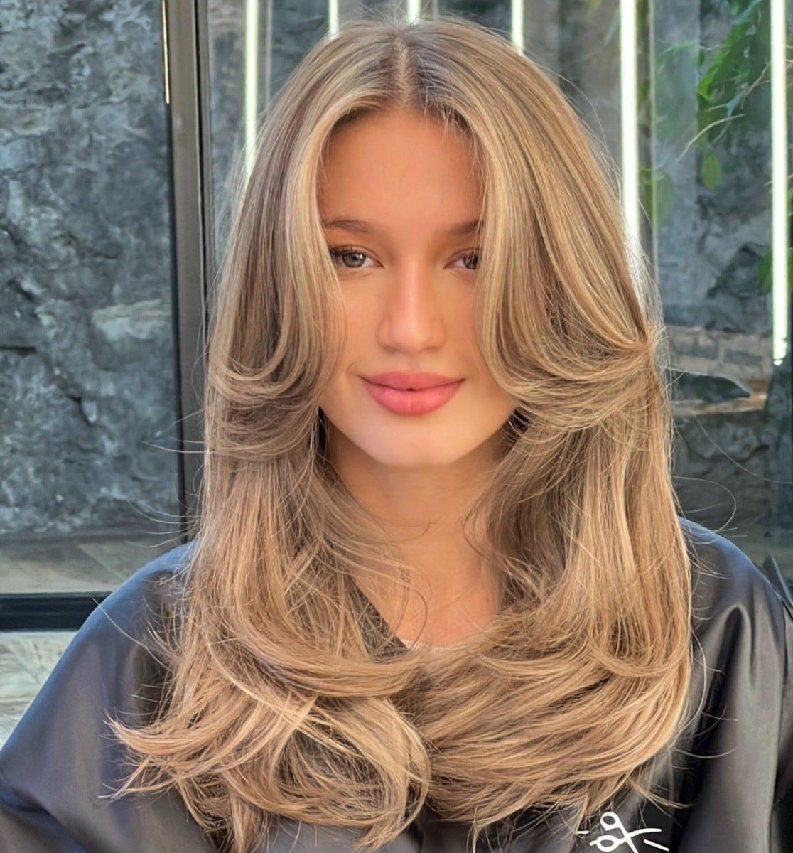 Shoulder length layered blowout haircut with feathered ends