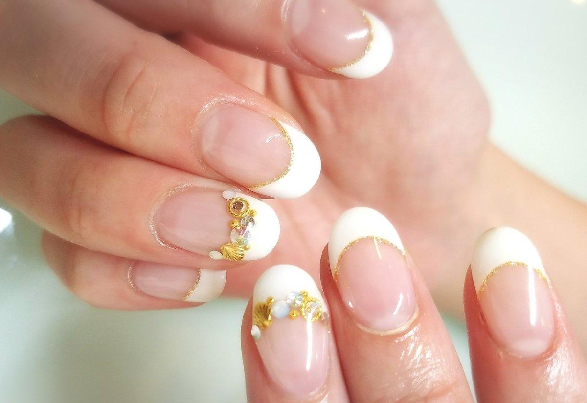 Gold accented gemstone French nails