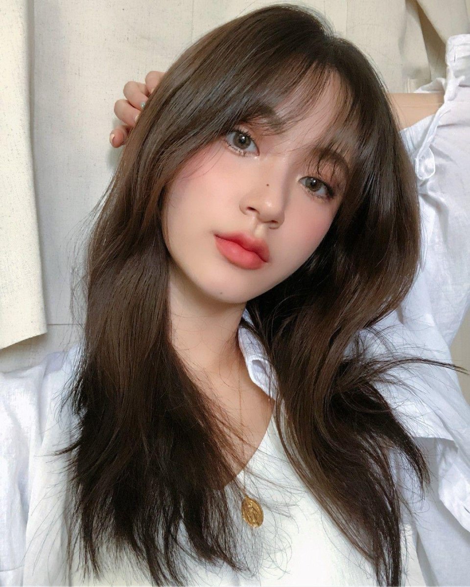 Korean inspired wispy curtain bangs