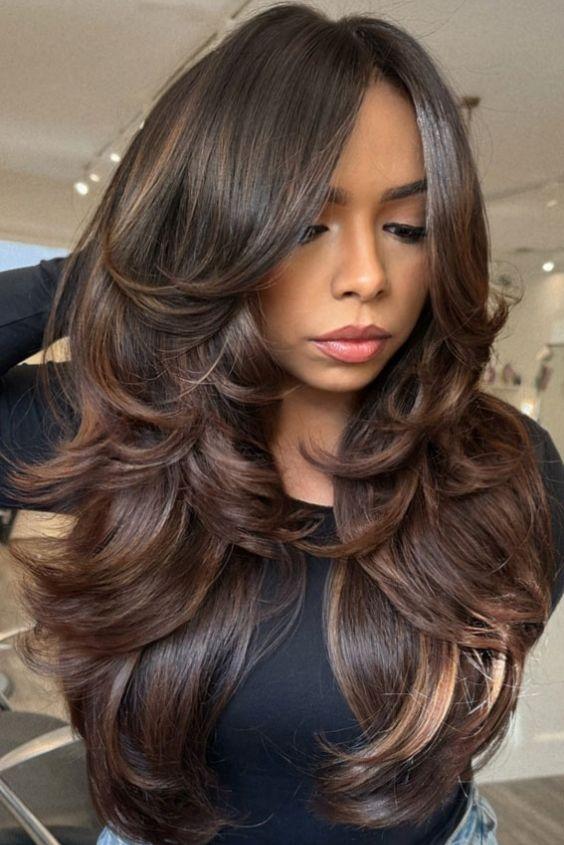 Chocolate brown layered blowout haircut with bounce