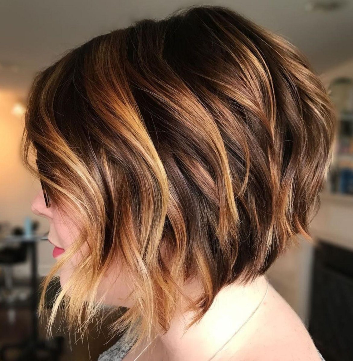 Layered brown bob with warm highlights