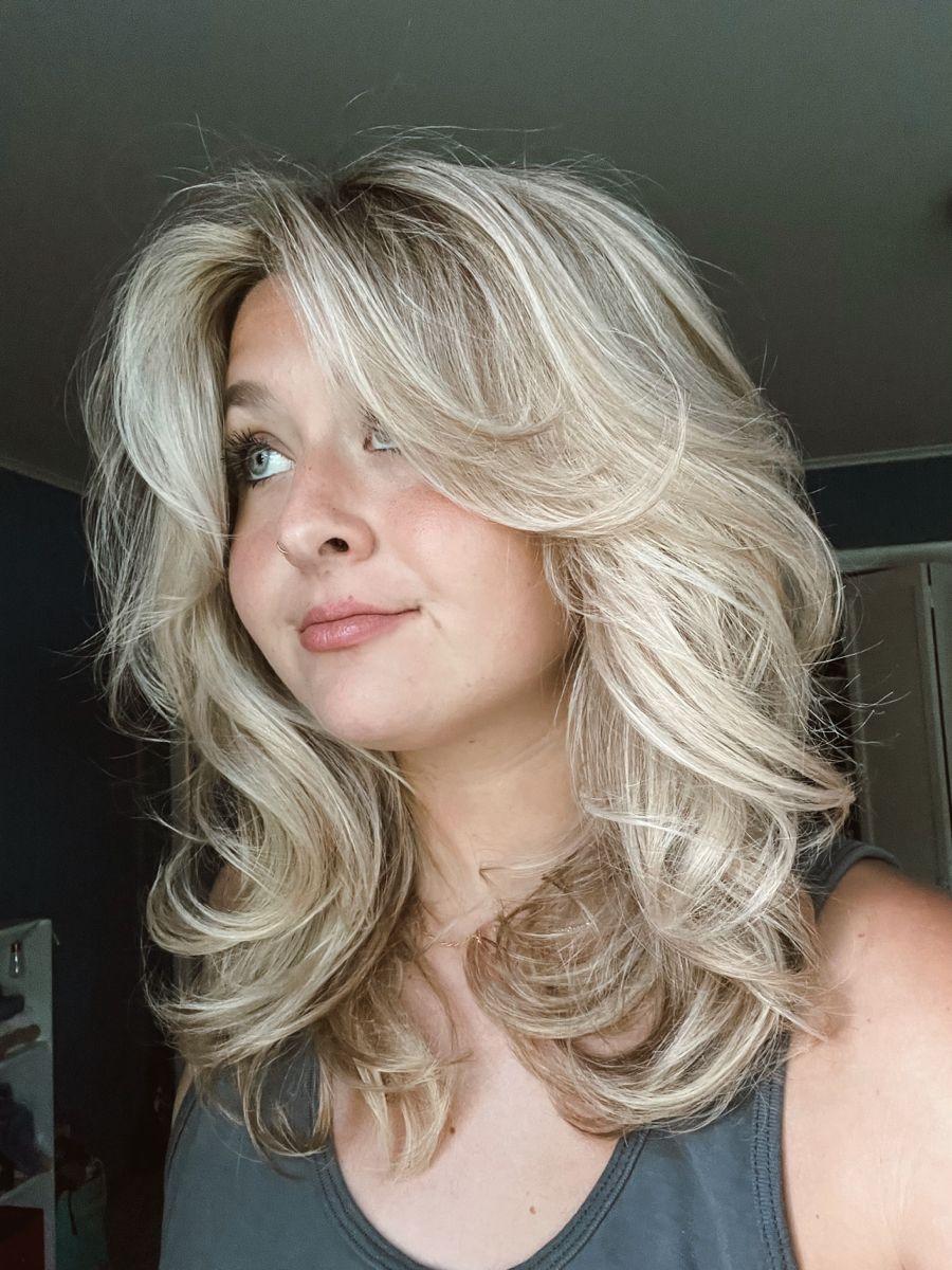 Medium length bouncy 90s blowout layers