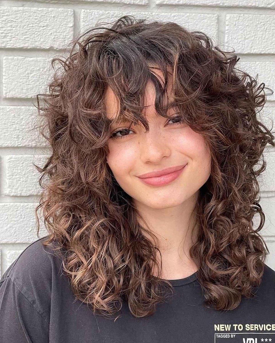 Medium wolf cut curly hair