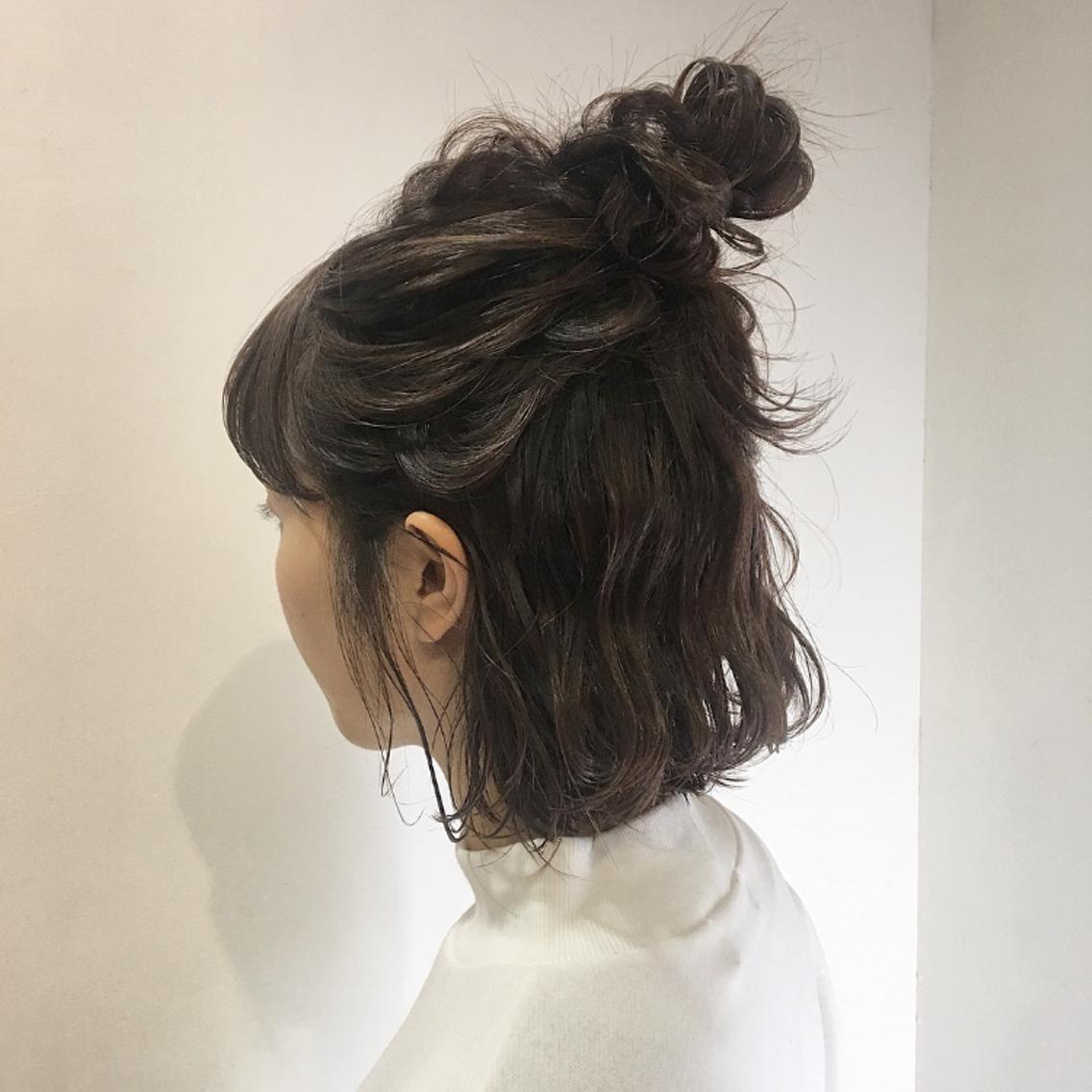 Messy half up bun short hair texture
