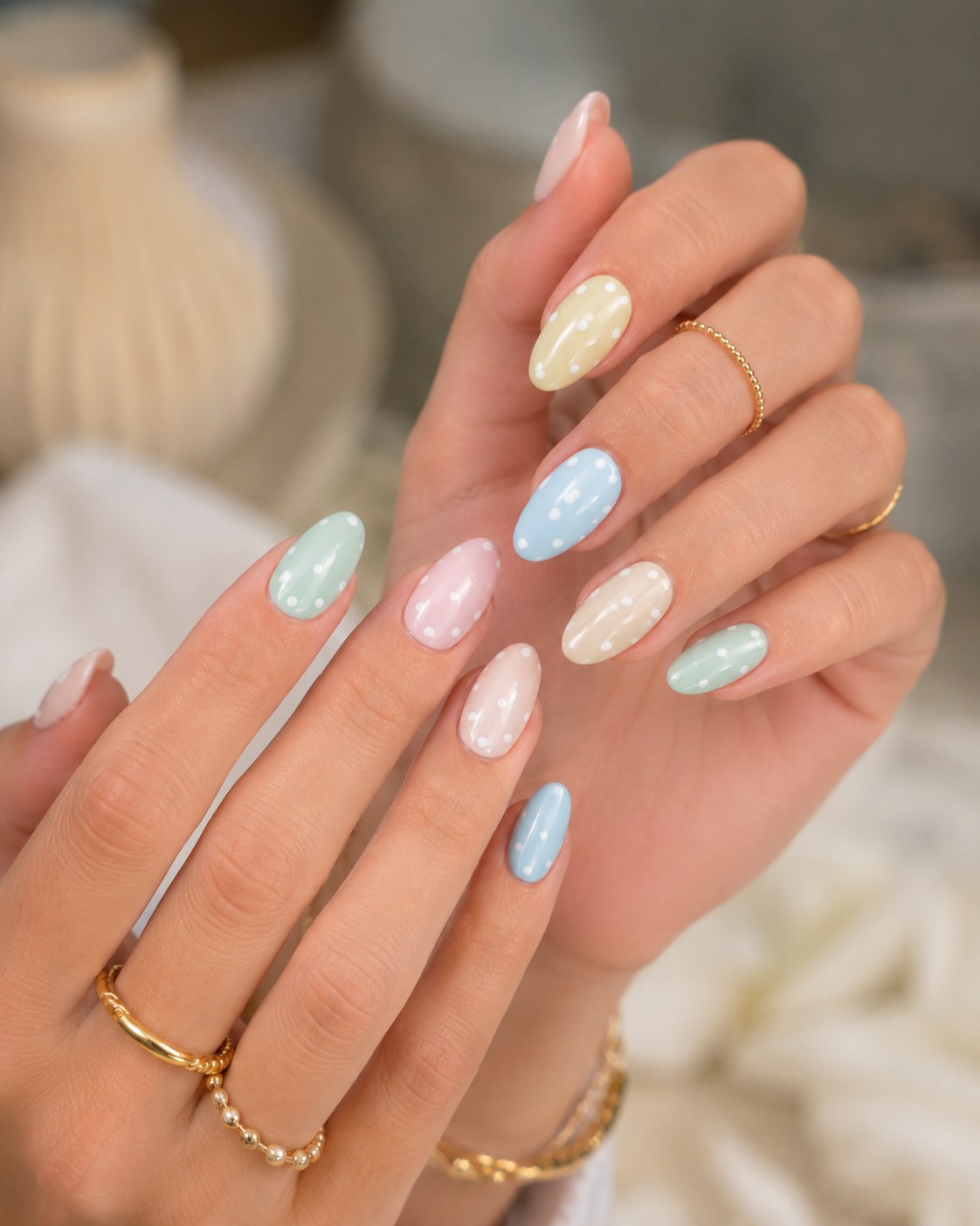 Pastel marble swirl nails in mint, pink and blue for a soft spring look