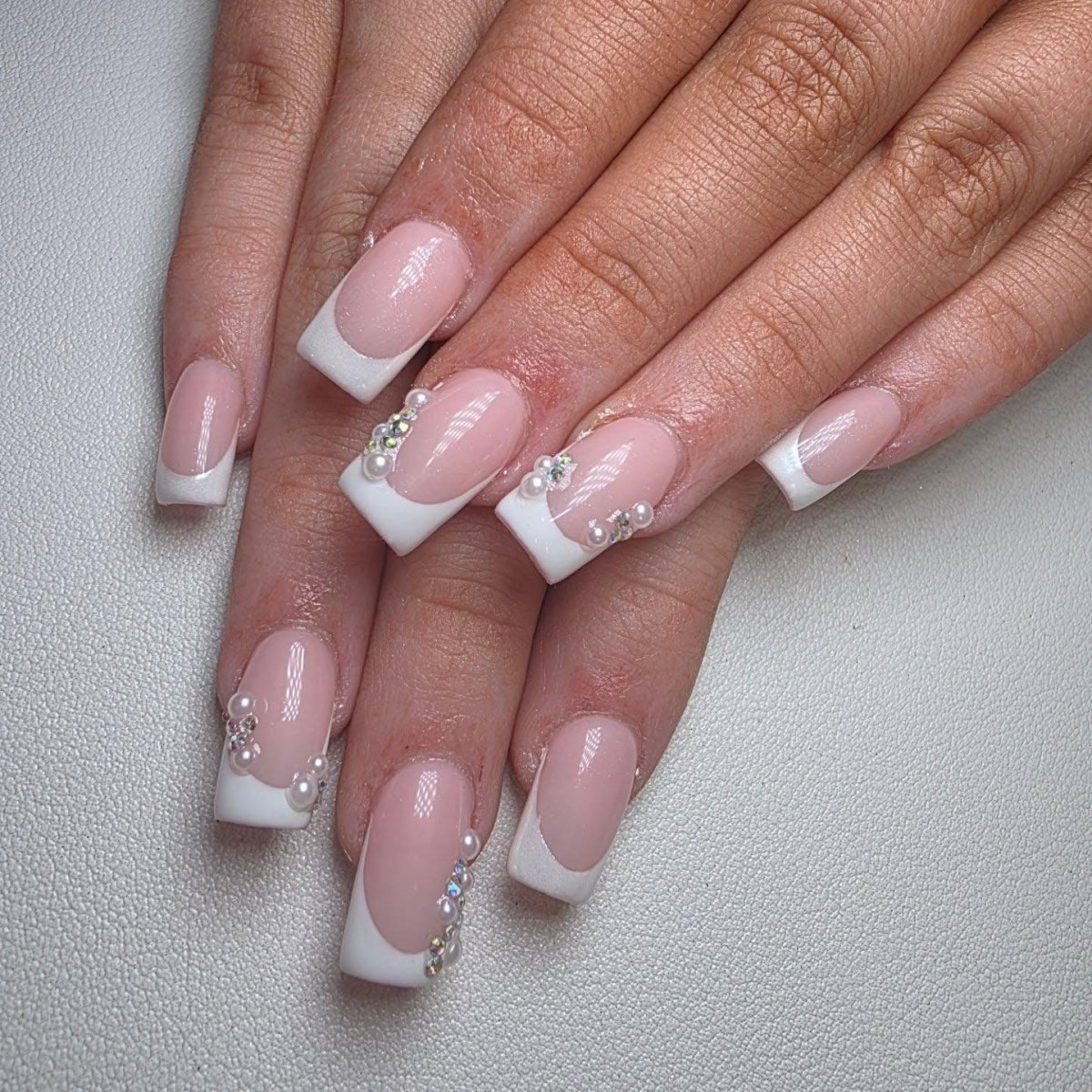 Pearl and crystal French manicure