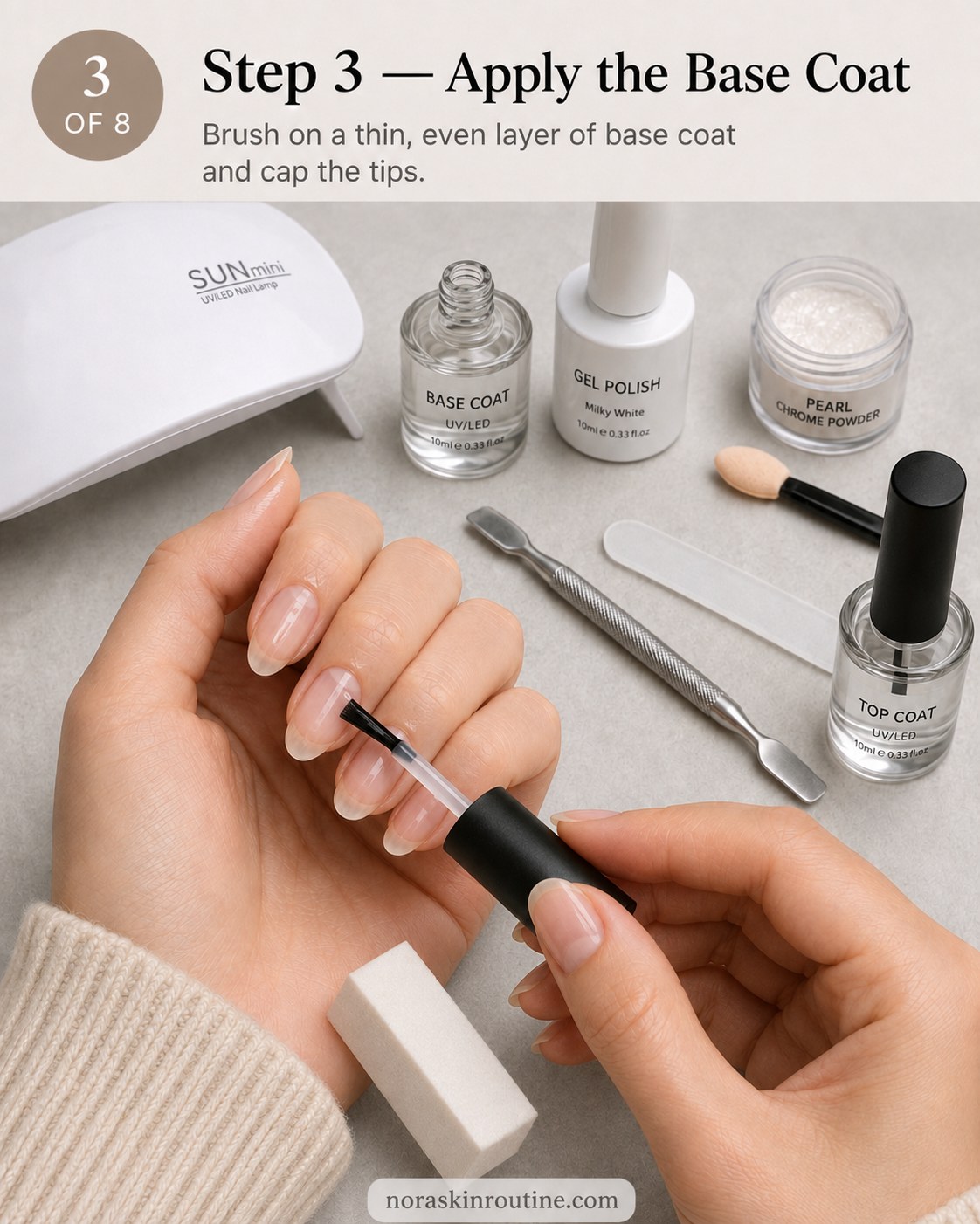 Brushing a thin base coat and capping the tips for long-lasting pearl chrome nails