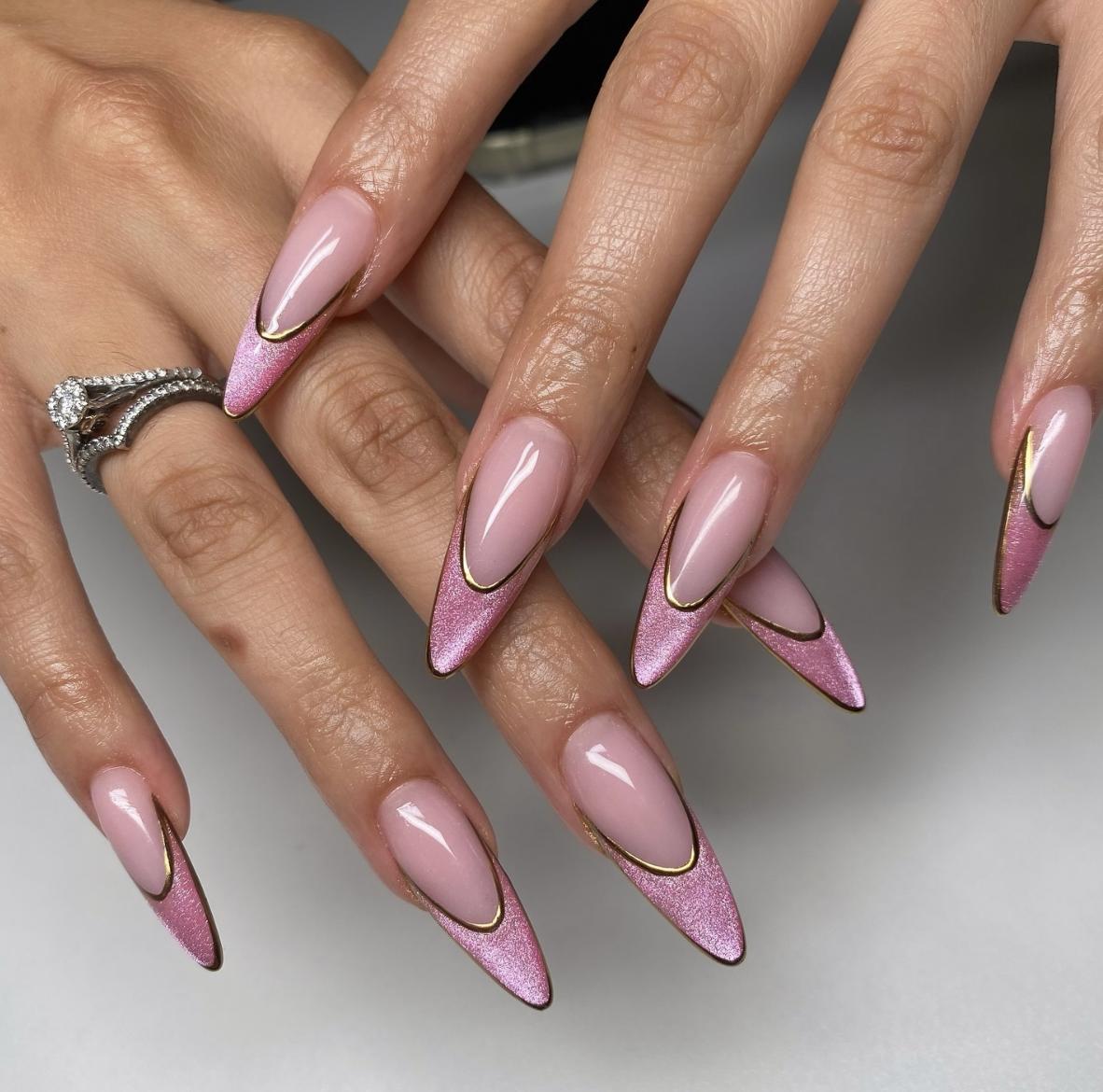Pink chrome nails gold accents