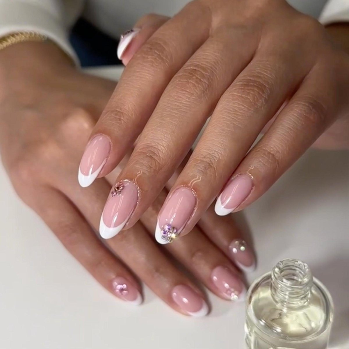 Pink gemstone French manicure