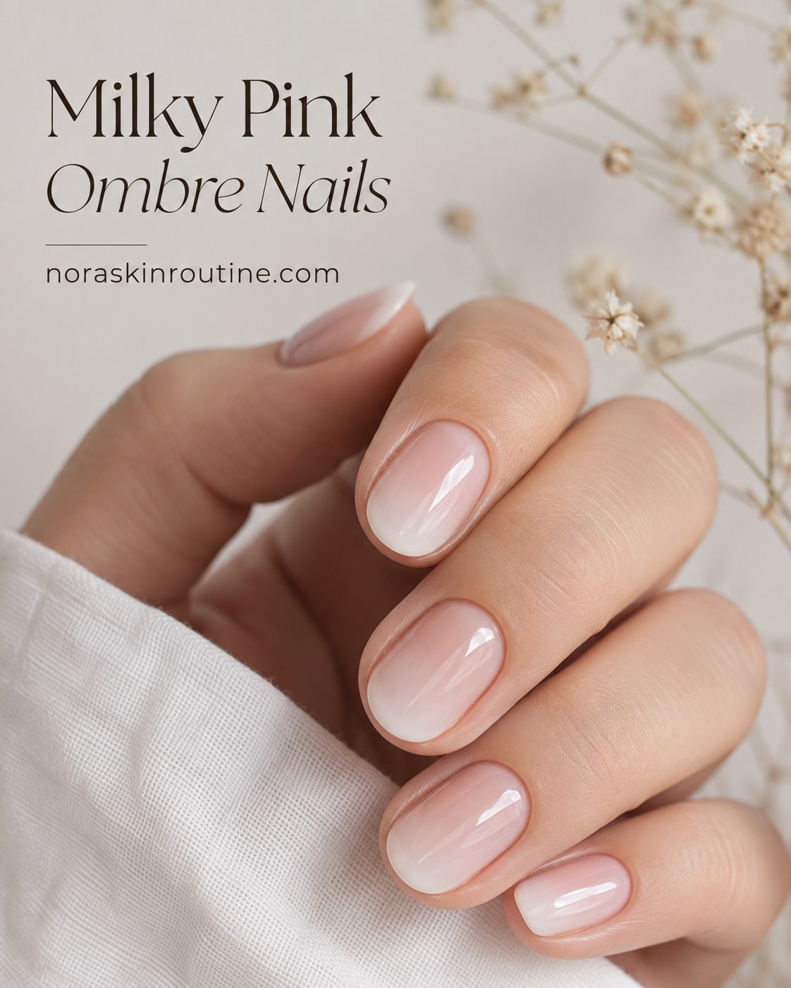 Milky pink ombre short nails fading from sheer pink to white at the tips