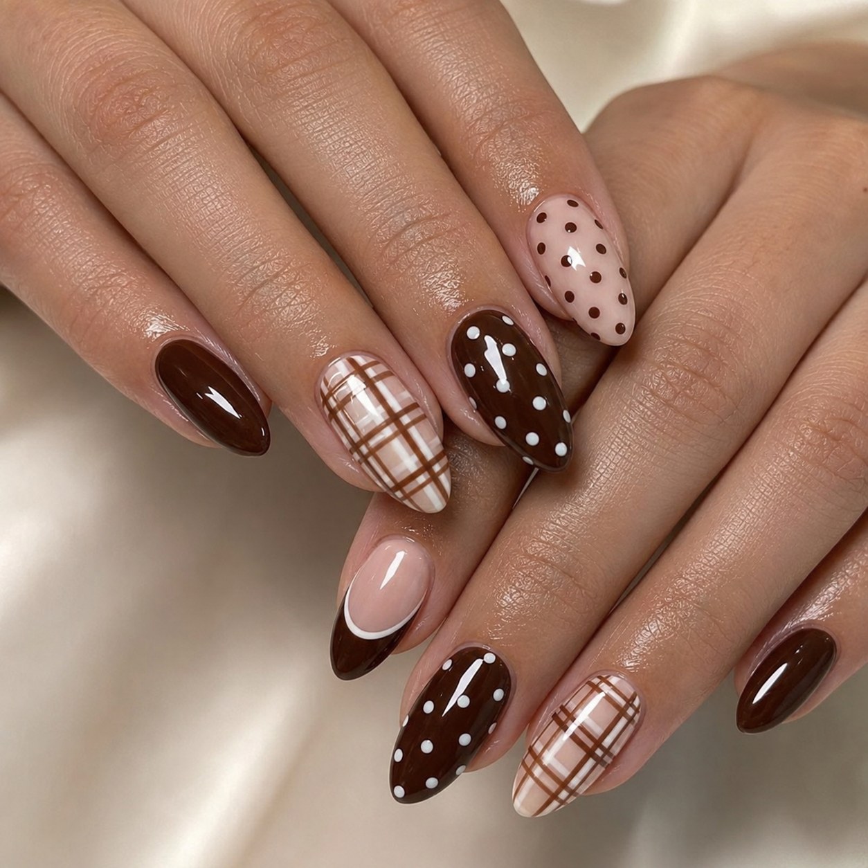 Brown plaid polka dot nail art combined with chocolate and cream tones