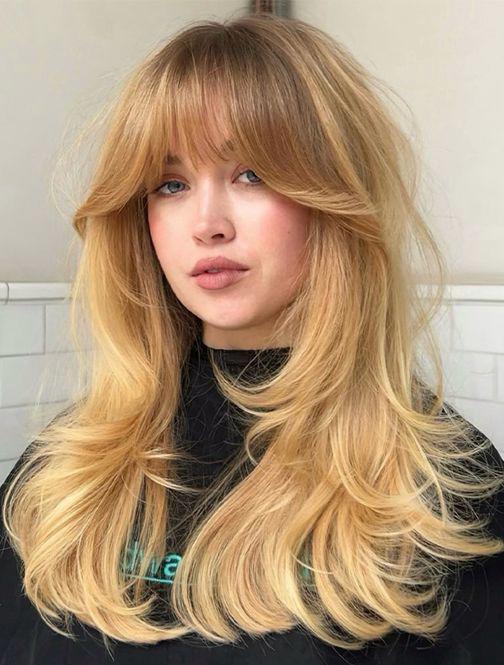 Retro wispy curtain bangs hairstyle