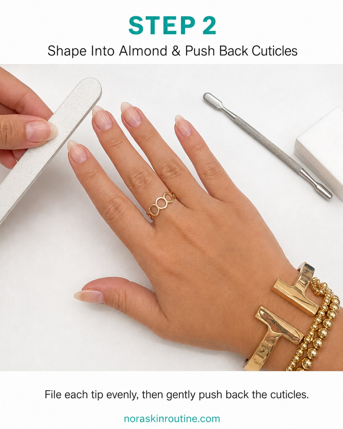 Filing the nail into a soft almond shape and pushing back cuticles for teal chrome almond nails