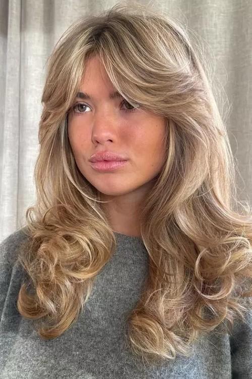 Fine hair volume with wispy curtain bangs