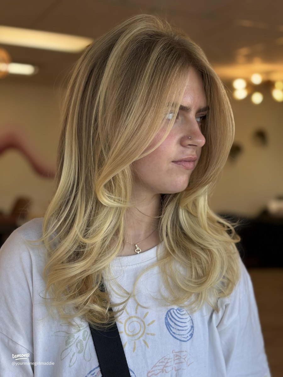Wispy layered 90s blowout haircut